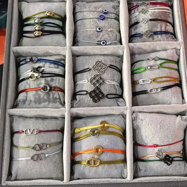 Bracelets and chains in a display tray