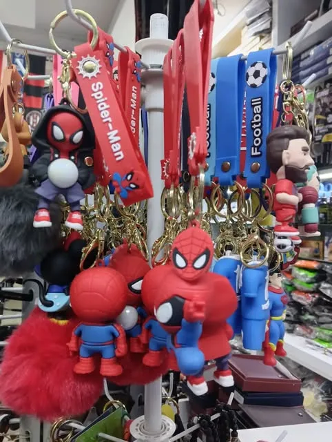 Character keychains hanging on a rack