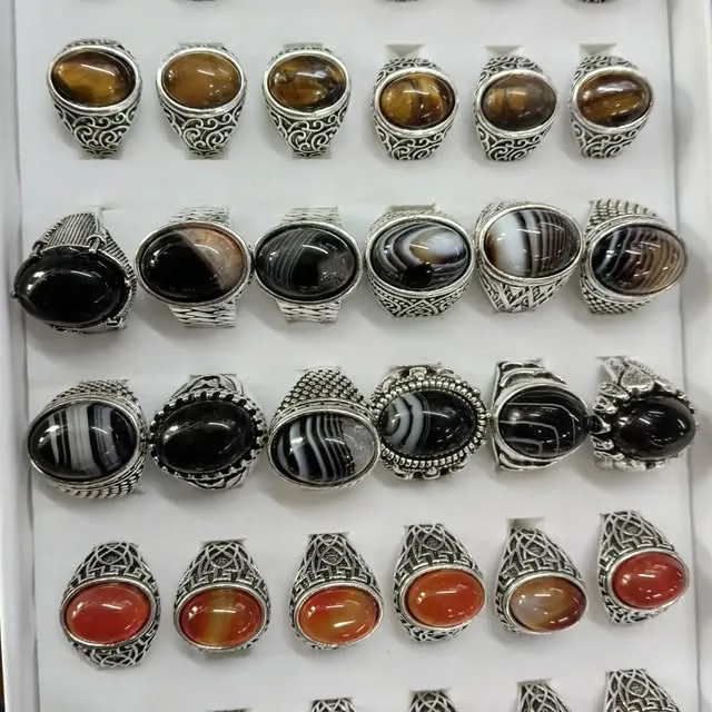 Rings with stones laid out on a tray